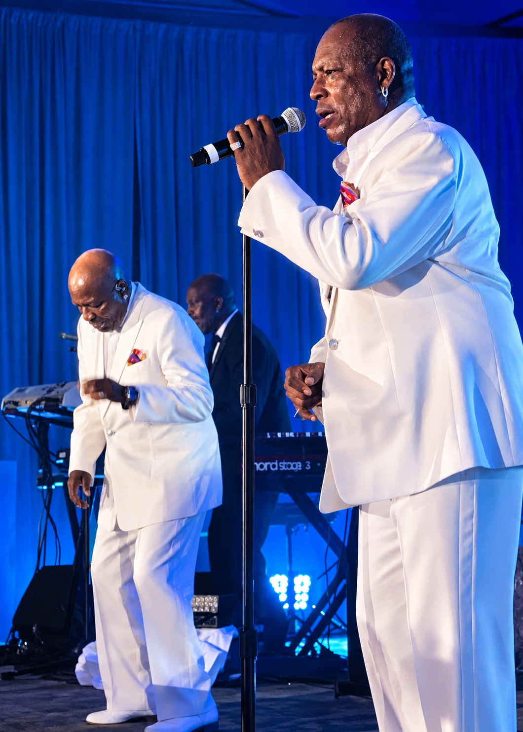 The O'Jays performing live on stage at a private event booked by VC Signature Events