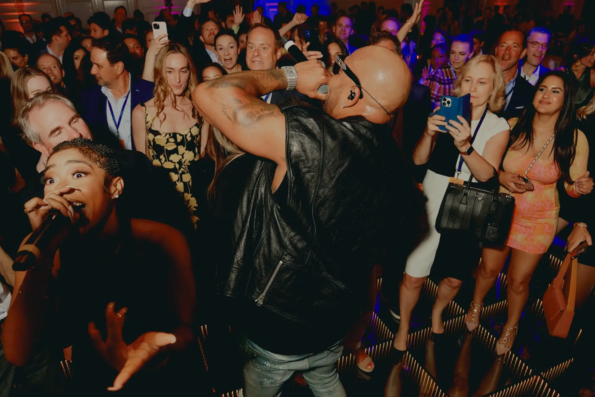 Flo Rida performing live among the crowd at a private event booked by VC Signature Events