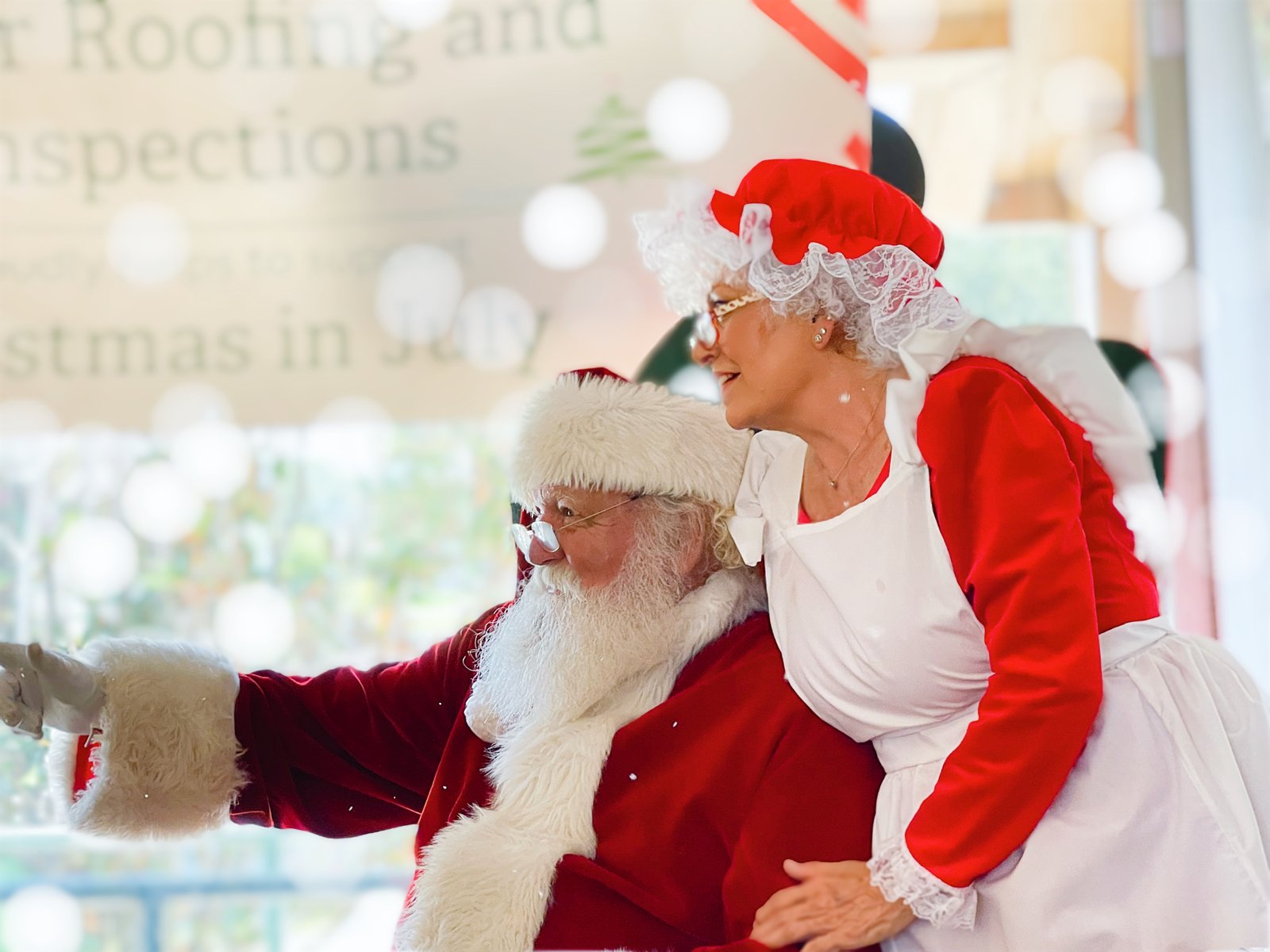 Santa and Mrs. Claus character performers at a holiday event