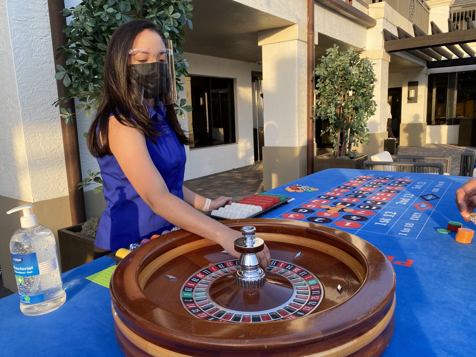 Casino roulette table with dealer at a themed event