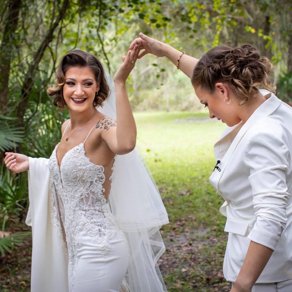 Bride dancing with the Valentin Creative team