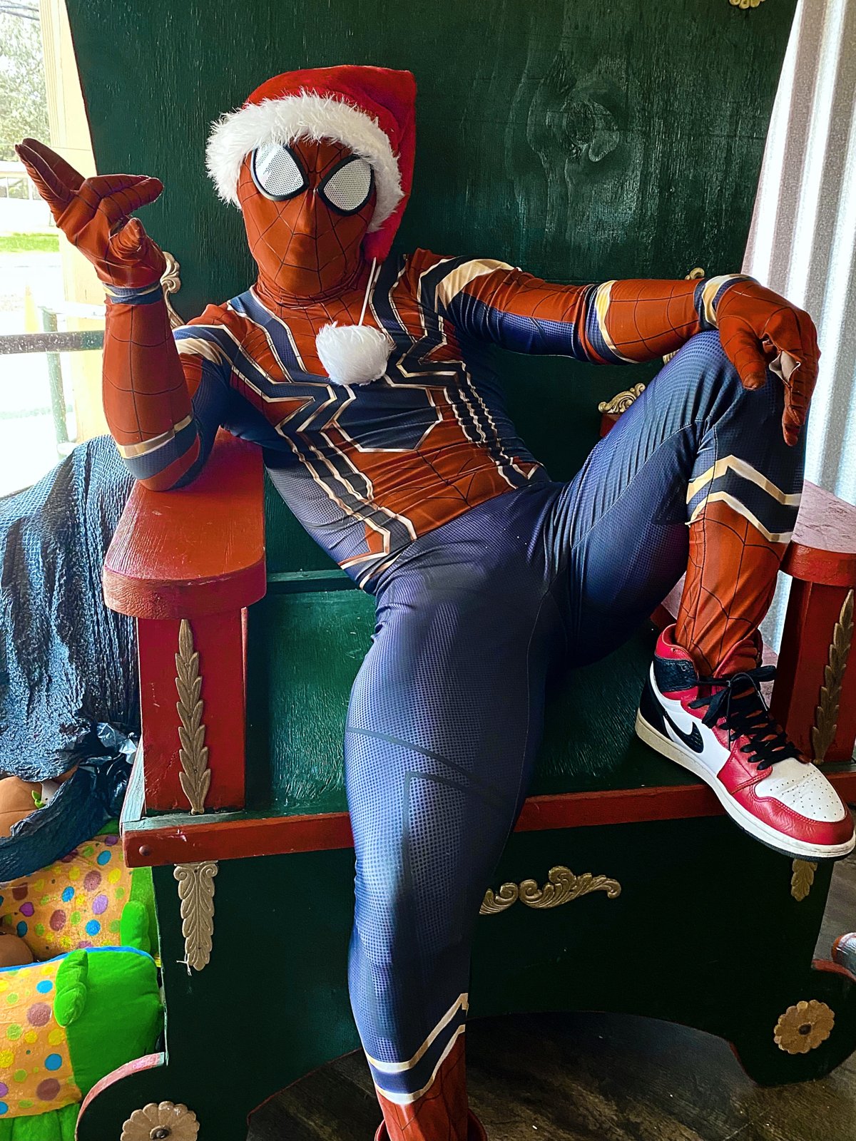 Spider-Man character performer posing with guests